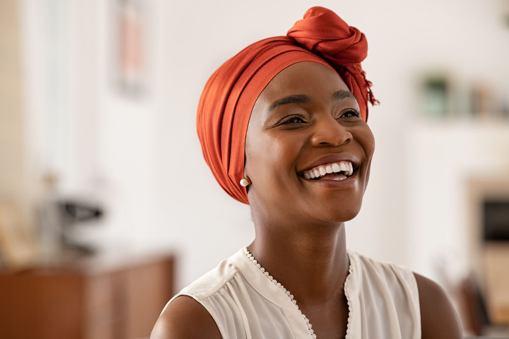 Woman with healthy bright smile after cosmetic dental care at A Briter Smile Dental Group